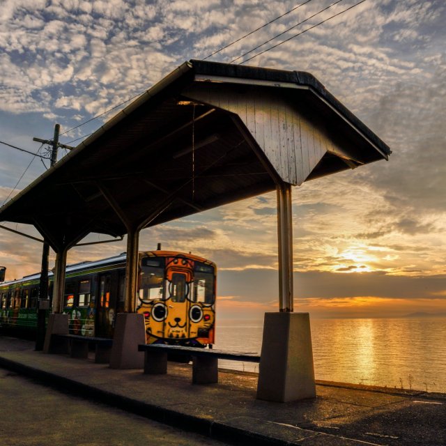 Sunset over The Blue Sea with Iyonada Monogatari Train